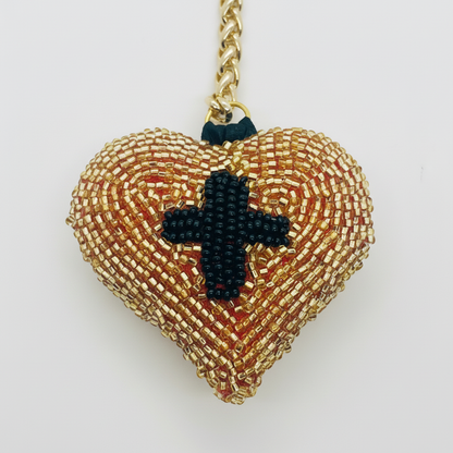 Close-up detail of sacred heart beadwork