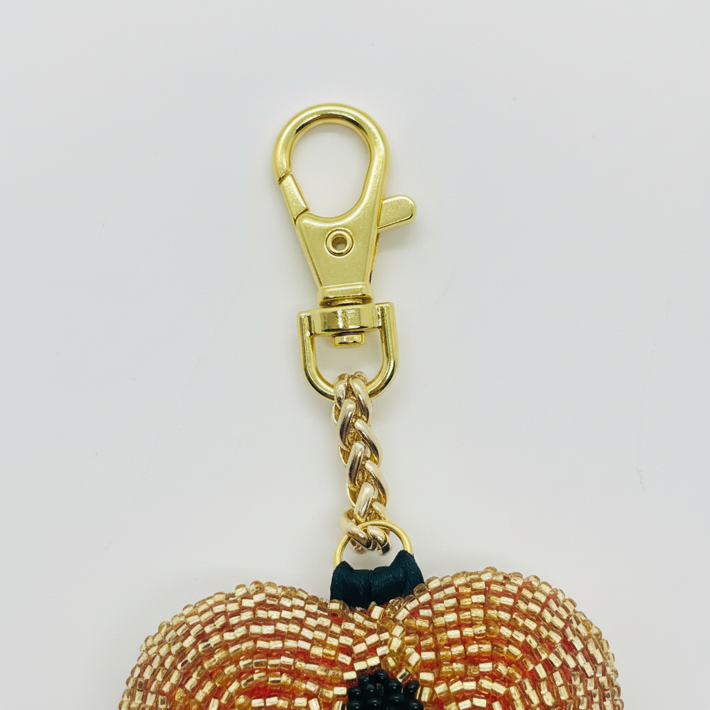 Gold rope chain and clasp detail